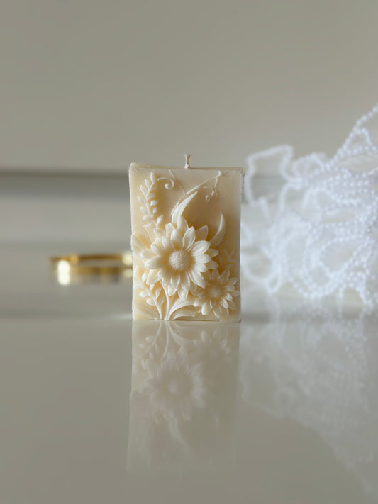 Flowers block candle